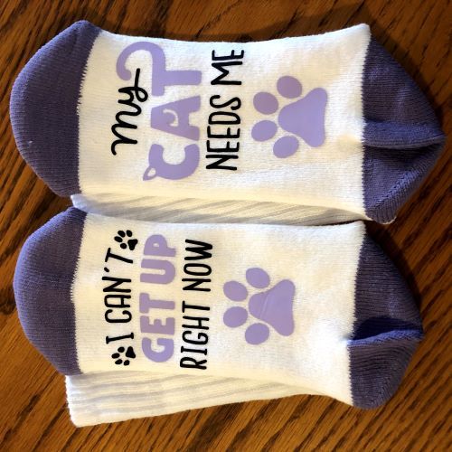 I Can't Get Up My Cat Needs Me